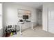 Bright office with modern standing desk and dumbbell weights at 27674 E 7Th Dr, Aurora, CO 80018