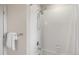 Shower featuring white subway tile surround, chrome fixtures, and a shower head at 27674 E 7Th Dr, Aurora, CO 80018