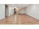 Unfinished basement with vinyl flooring, neutral paint, baseboard trim, and utility hookups at 4720 S Grant St, Englewood, CO 80113