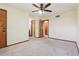 Spacious bedroom with connecting doorways to the bathroom and closet areas at 4720 S Grant St, Englewood, CO 80113