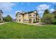 Stylish condo building exterior, showcasing lush landscaping and well-kept grounds at 7489 S Quail Cir # 814, Littleton, CO 80127