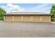 A row of garages with neutral-colored doors, providing ample parking space for residents at 7489 S Quail Cir # 814, Littleton, CO 80127