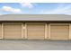 Individual garages with unit numbers offer private parking and storage for residents at 7489 S Quail Cir # 814, Littleton, CO 80127