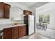 The kitchen has wood cabinets, granite countertops, stainless steel appliances and a dining area at 7489 S Quail Cir # 814, Littleton, CO 80127