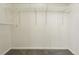 Spacious walk-in closet with carpet floors and multiple rows of shelving at 7489 S Quail Cir # 814, Littleton, CO 80127