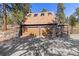 Two-car garage with ample driveway space, skylights and side access door at 4948 Cameyo Rd, Indian Hills, CO 80454