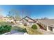 Well maintained back yard with mature trees and manicured lawn at 8199 W 67Th Ave, Arvada, CO 80004