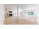 Spacious finished basement with a cozy fireplace and mantel at 8199 W 67Th Ave, Arvada, CO 80004