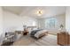Relaxing bedroom with a queen bed, neutral colors, and natural light at 8199 W 67Th Ave, Arvada, CO 80004