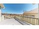 Large deck with beautiful views and wood railings at 8199 W 67Th Ave, Arvada, CO 80004