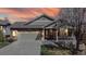 Charming single-Gathering home boasts a well-maintained front yard, covered porch, and a two-car garage, perfect for suburban living at 8199 W 67Th Ave, Arvada, CO 80004