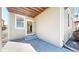 Spacious back patio area with an open door way to the home at 8199 W 67Th Ave, Arvada, CO 80004