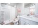 This bathroom includes a tub, a sink with faucet, and modern décor at 3879 N Shawnee St, Aurora, CO 80019