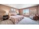 A bright bedroom with large window views and ample natural lighting at 3879 N Shawnee St, Aurora, CO 80019