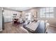 Open floorplan dining area with view to kitchen with island and stainless appliances at 3879 N Shawnee St, Aurora, CO 80019