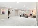 Finished basement with recessed lighting and neutral-toned decor at 7442 S Wellington St, Centennial, CO 80122