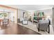 Cozy living room with hardwood floors, stylish furnishings, and an open layout at 7442 S Wellington St, Centennial, CO 80122