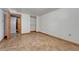 Basement bedroom with closet and neutral walls ready for personalization at 7541 Julian St, Westminster, CO 80030