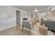 Open basement living room, including plush seating, stylish rug, and ample space for your personal touches at 7541 Julian St, Westminster, CO 80030