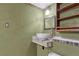 Half bathroom with a modern sink and vanity, perfect for guests at 7541 Julian St, Westminster, CO 80030