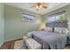 Comfortable bedroom featuring plush bedding, soft lighting, and hardwood floors, creating a relaxing retreat at 7541 Julian St, Westminster, CO 80030