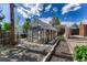 Backyard greenhouse offering a space for year-round gardening and plant cultivation at 7541 Julian St, Westminster, CO 80030