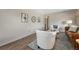 Inviting living room features stylish furnishings, with hardwood floors, and great natural light at 7541 Julian St, Westminster, CO 80030