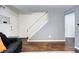 Spacious living room featuring hardwood floors, neutral paint, and modern fixtures at 4856 E Hinsdale Pl, Centennial, CO 80122