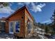 Wooden studio with large windows and mountain views at 9308 Fallen Rock Rd, Conifer, CO 80433