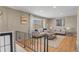 Well-appointed living room featuring hardwood floors, stylish decor, and a cozy atmosphere, perfect for relaxation at 9598 Lou Dr, Northglenn, CO 80260