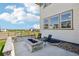 The backyard features a stone fire pit and chairs, an ideal spot for relaxation and gatherings at 6558 Kenzie Cir, Castle Pines, CO 80108