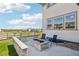 Enjoy the backyard featuring a stone fire pit and seating, perfect for outdoor entertaining at 6558 Kenzie Cir, Castle Pines, CO 80108