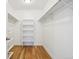 This walk-in closet features a clothing rack and shelves for storage and organization at 6558 Kenzie Cir, Castle Pines, CO 80108