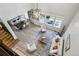 Bright, open-concept living space showcasing the seamless flow between the living, dining, and kitchen areas at 6558 Kenzie Cir, Castle Pines, CO 80108