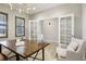 Bright office space with a statement desk, natural light, and modern decorative touches at 6558 Kenzie Cir, Castle Pines, CO 80108
