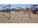 Community playground featuring swings, slides, and climbing structures for outdoor fun at 6558 Kenzie Cir, Castle Pines, CO 80108