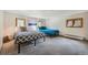 Spacious bedroom with carpet flooring, multiple windows, and two beds with colorful bedding at 5739 Highway 9, Breckenridge, CO 80424