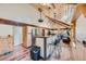 Open-concept kitchen with a breakfast bar, modern appliances, and seamless flow to the dining and living areas at 5739 Highway 9, Breckenridge, CO 80424