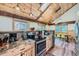 Well-equipped kitchen featuring modern appliances, granite countertops, and ample cabinet space for cooking at 5739 Highway 9, Breckenridge, CO 80424