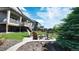 Beautiful backyard featuring a fire pit with Adirondack chairs, ideal for gatherings and enjoying the outdoors at 8867 S Zante St, Aurora, CO 80016