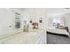 Stylish bathroom with granite countertops, dual sinks, and view into the bedroom area at 8867 S Zante St, Aurora, CO 80016