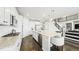 Kitchen with an island featuring stainless steel appliances and a breakfast bar at 8867 S Zante St, Aurora, CO 80016