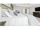 Inviting main bedroom featuring soft, neutral tones and a cozy, comfortable aesthetic at 8867 S Zante St, Aurora, CO 80016