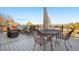 Large back deck with outdoor dining and seating, ideal for enjoying views at 1621 Beacon Hill Dr, Highlands Ranch, CO 80126