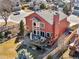 Exterior view featuring a deck with outdoor seating and a spiral staircase at 1621 Beacon Hill Dr, Highlands Ranch, CO 80126