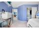 Bedroom showcasing a neat closet, white dresser, and desk, seamlessly connected to a tidy workspace at 1621 Beacon Hill Dr, Highlands Ranch, CO 80126