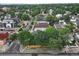 This aerial view showcases a charming neighborhood with a mix of architectural styles and lush, mature trees lining the streets at 1707 W 39Th Ave, Denver, CO 80211