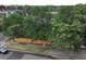 An aerial perspective displays tree coverage surrounding property highlighting neighborhood greenery and privacy at 1707 W 39Th Ave, Denver, CO 80211