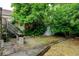 The outdoor space includes a storage shed and mature trees at 1707 W 39Th Ave, Denver, CO 80211