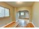 Inviting living room featuring hardwood floors and an arched doorway for a warm and open feel at 1707 W 39Th Ave, Denver, CO 80211